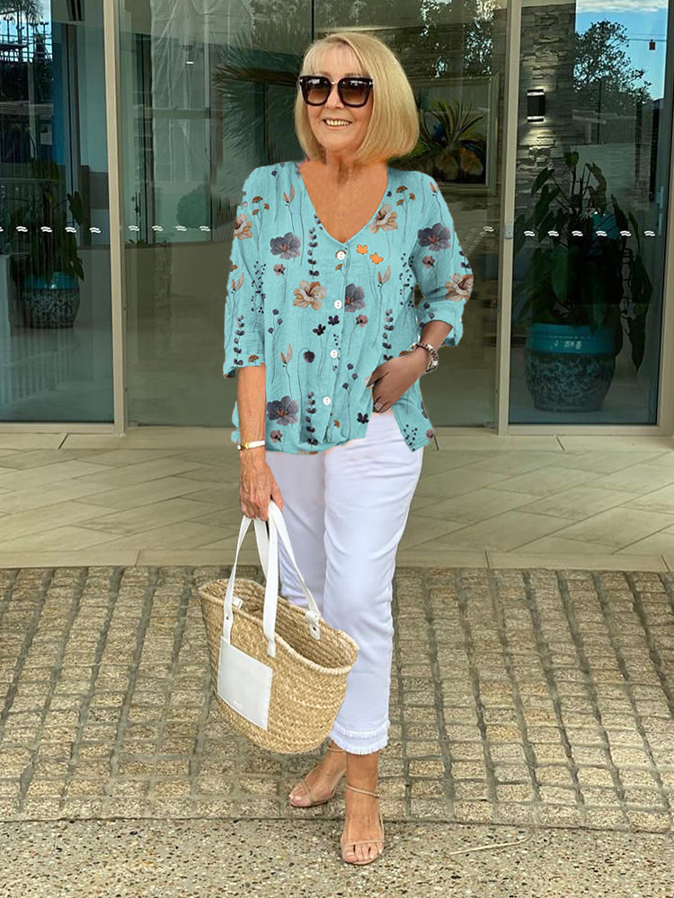 DELILAH | BLOUSE FLORALE À BOUTON STYLÉE