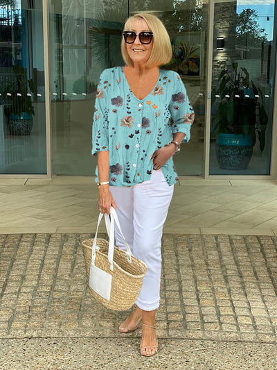 DELILAH | BLOUSE FLORALE À BOUTON STYLÉE